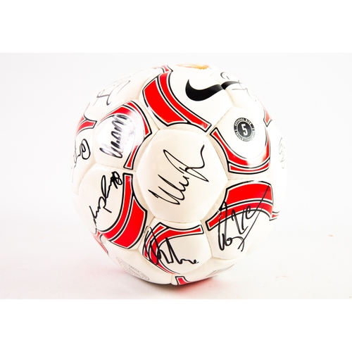 224 - OFFICIAL MANCHESTER UNITED INTERNATIONAL STANDARD FOOTBALL, signed by Manchester United team players... 