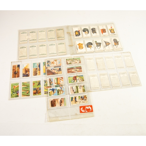 200 - CIGARETTE CARDS: 50 Military Head Dress, John Player; 30 Garden Hints, WD Wills (80)