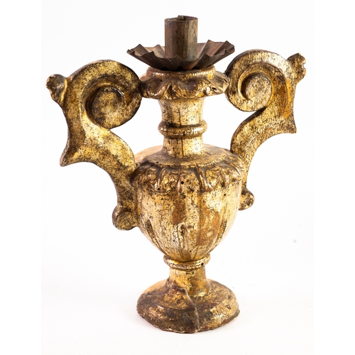 76 - 18TH CENTURY ITALIAN CARVED AND GILT WOOD MANTEL CANDELSTICK, fluted urn shaped with two large scrol... 