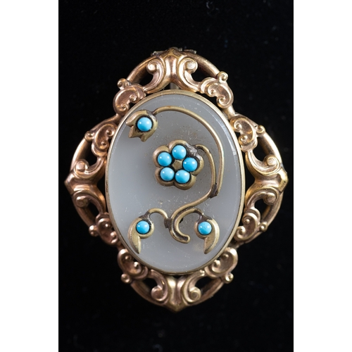 460 - VICTORIAN GOLD PLATED METAL OVAL BROOCH set with a moonstone overlaid with a wire floral spray, set ... 