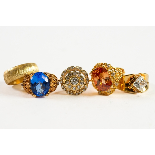 512 - GOLD-PLATED SILVER RINGS, 2 of similar style with ornate shoulders, one claw set with a blue stone, ... 