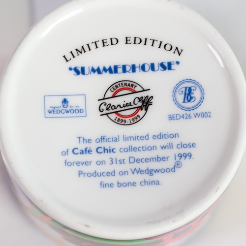 5 - FOUR WEGWOOD CLARICE CLIFF CENTENARY CHINA COFFEE CANS AND SAUCERS, ‘SUMMERHOUSE’, ‘BLUE FIRS’, ‘AUT... 