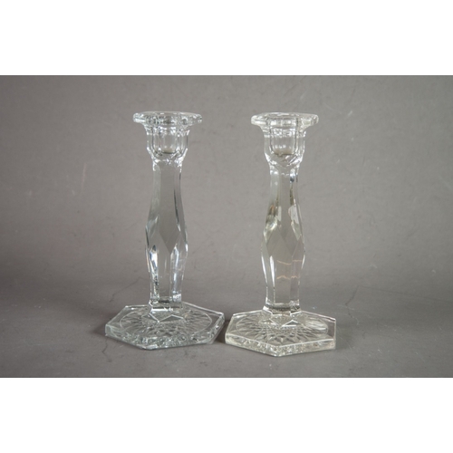 214 - PAIR OF MOULDED GLASS HEXAGONAL CANDLESTICKS, 8 1/4