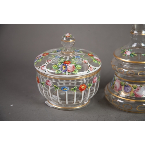 215 - FOUR ITEMS OF LATE 19TH CENTURY CLEAR GLASS enamelled with flowers enriched with gilding, comprising... 