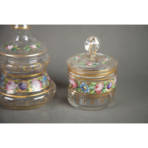 215 - FOUR ITEMS OF LATE 19TH CENTURY CLEAR GLASS enamelled with flowers enriched with gilding, comprising... 