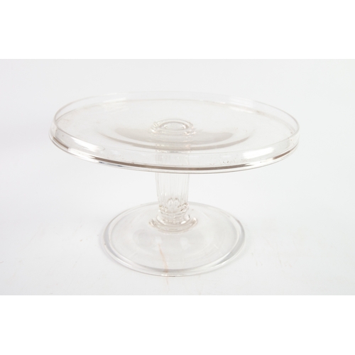 226 - GEORGIAN EARLY 19th CENTURY LARGE GLASS PEDESTAL CAKE STAND, with raised gallery border to the circu... 