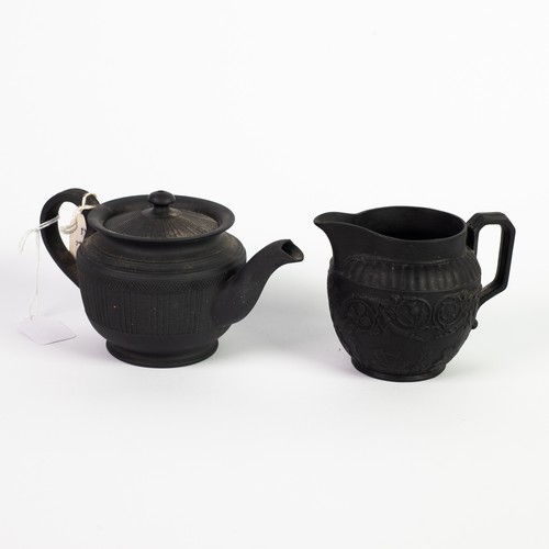 17 - EARLY WEDGWOOD BLACK BASALT OVULAR JUG, embossed with motifs representing the British nations, 3 1/4... 