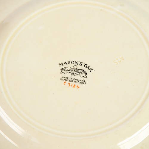 59 - MASON'S IRONSTONE CHINA OAK-PATTERN DINNER SERVICE FOR 12 PERSONS, the borders embossed with oak spr... 