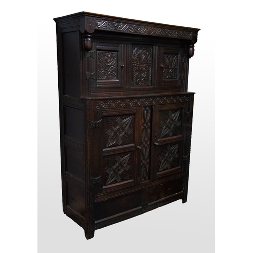 1 - ANTIQUE CARVED OAK DIDARN OR CWPWRRD DEUDDARN, the canopy cornice dated 1670, initialled I B E and c... 