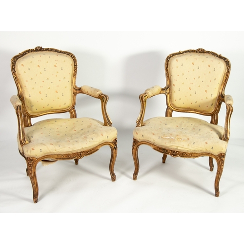 24 - PAIR OF NINETEENTH CENTURY CARVED GILTWOOD FAUTEUILS OR OPEN ARMCHAIRS, each with moulded show wood ... 