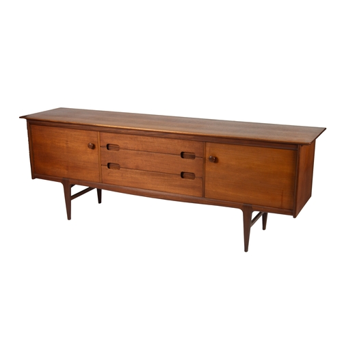 45 - A. YOUNGER Ltd, TEAK LONG SIDEBOARD, of typical form with central bank of three drawers, the top one... 