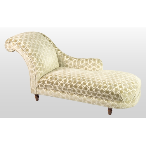 35 - VICTORIAN STYLE CHAISE LONGUE, with scroll end, short back and turned supports, covered in cream and... 