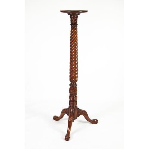 38 - REPRODUCTION MAHOGANY TORCHERE, of typical form with wrythen fluted column and leaf capped tripod su... 