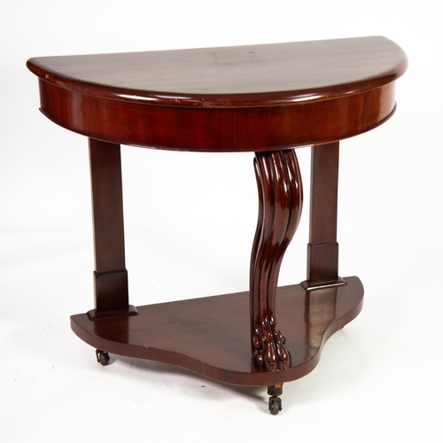 28 - DUCHESS STYLE MAHOGANY BOW FRONTED WASH STAND OR SIDE TABLE, with solid top, claw foot to the scroll... 