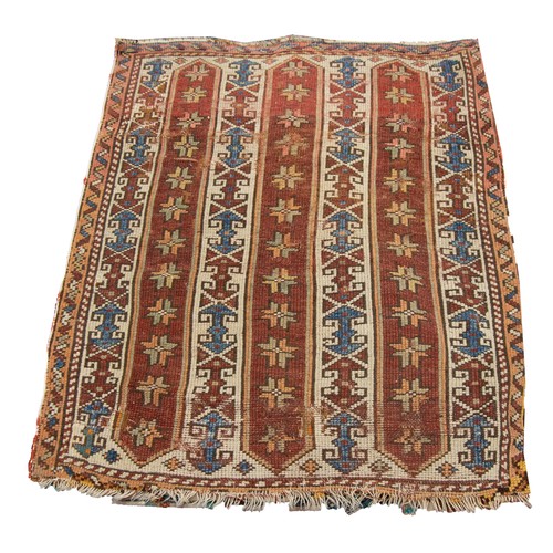 60 - SEMI-ANTIQUE FLAT WEAVE RUG with alternate red and white stripes, each with a repeat pattern, the ma... 