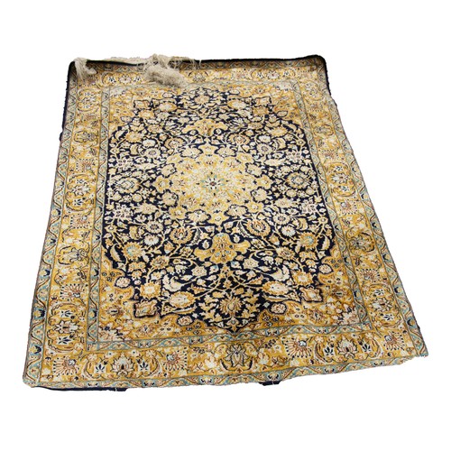 57 - KIRMAN SILKY PILE RUG closely knotted with a floral circular centre medallion with pendants and all-... 