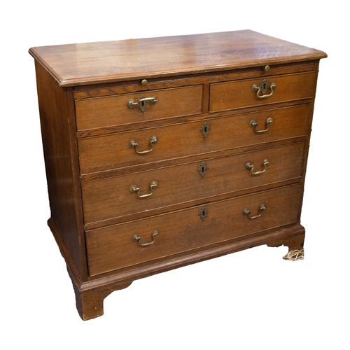 17 - GEORGE III BACHELOR’S CHEST: George III oak bachelor’s chest of two over three drawers, with brushin... 