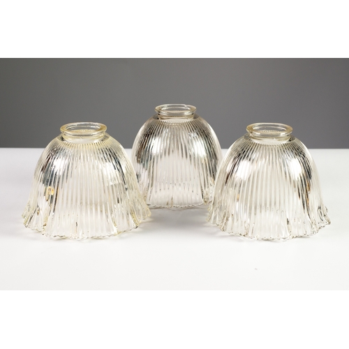 29 - HOLOPHANE: Three mid-twentieth century Holophane glass lampshades, each 4 ¾” (12 cm) drop [3]