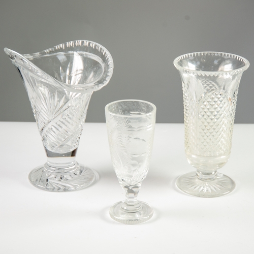 30 - THREE CUT GLASS VASES, including a heavy fan shaped example, 10 ½” (26.7cm) high and smaller, (3)