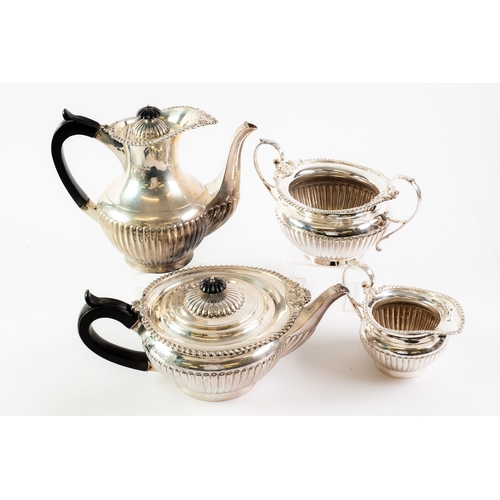 540 - VICTORIAN TEA SET: A Victorian silver four piece tea-set of half-reeded classical form, marked Londo... 