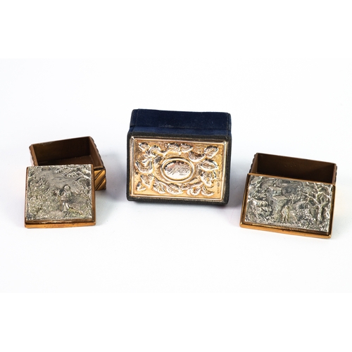 555 - CONTINENTAL BOXES: Three silver topped boxes, two similar with cast scenes to the lid, the first ‘Pr... 