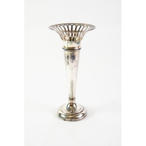 560 - TRUMPET VASE: George V silver reticulated trumpet vase, bearing inscription to the base upon the ret... 