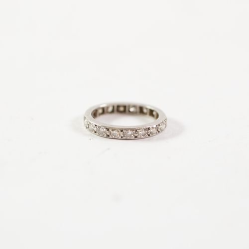 134 - WHITE GOLD or PLATINUM TINY DIAMOND SET ETERNITY RING, 2.9gms gross