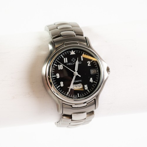 23 - GENT'S HELVECO AUTOMATIC STAINLESS STEEL WRISTWATCH with circular black arabic dial, centre seconds ... 