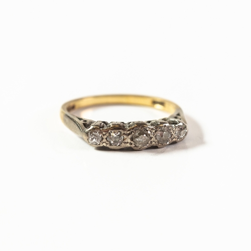 101 - 18ct GOLD RING, set with five old cut diamonds graduating from the centre, approximately .45ct in to... 