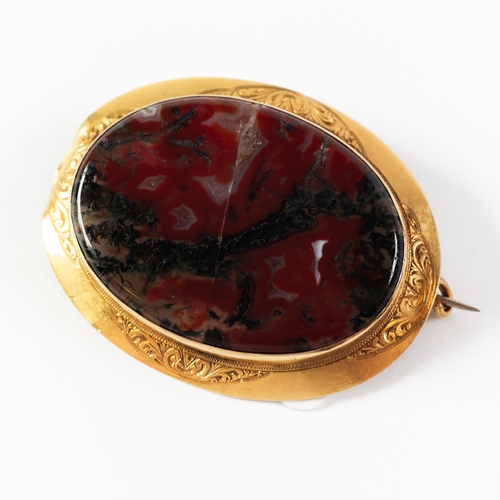 79 - MOSS AGATE OVAL BROOCH in 18ct gold frame with chased flat lower surround, 1 7/8in (4.5cm) wide, (c/... 