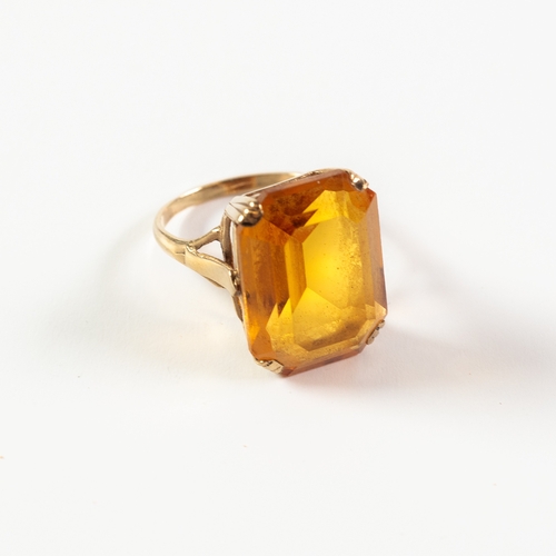 135 - 9ct GOLD DRESS RING set with a large emerald-cut citrine, 6gms