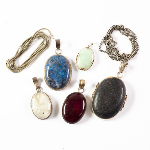 433 - FIVE VINTAGE POLISHED HARDSTONE AND 925 MARK SILVER MOUNTED OVAL PENDANTS; one with 925 mark chain n... 