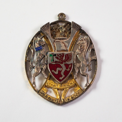 24 - VERMEIL SILVER AND ENAMEL OVAL MAYORAL PENDANT, pierced, awarded to Mavis Crosbie, Borough of Traffo... 