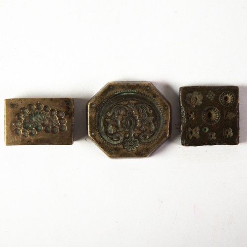 210 - THREE SMALL VINTAGE, POSSIBLY INDIAN, BRONZE JEWELLERY MOULDS, including heavy gauge octagonal examp... 