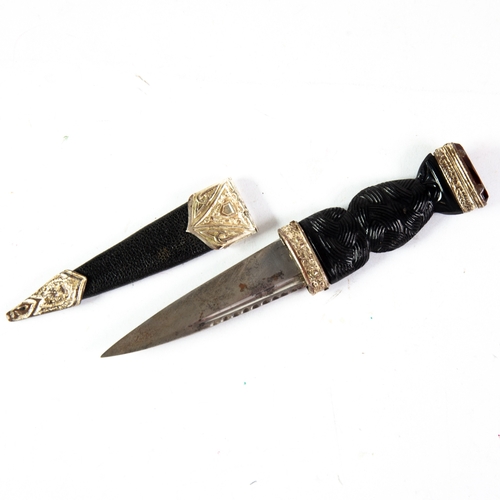 38 - SCOTTISH POST-WAR 'SGIAN DUBH' DRESS DAGGER AND SHEATH, of typical design having plated mounts and s... 