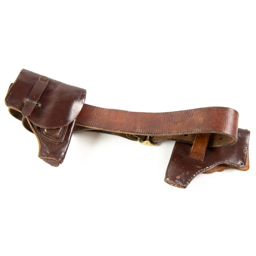 36 - EARLY 20th CENTURY BROAD BROWN LEATHER AND BRASS GUN BELT with contemporary pair of HOLSTERS for sma... 