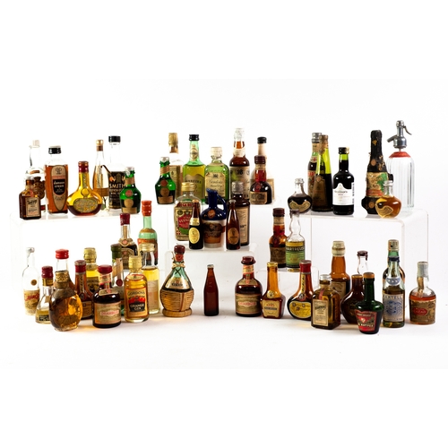 173 - COLLECTION OF MINIATURE VINTAGE WINES AND SPIRITS to include Chartreuse, Benedictine, Gordons London... 