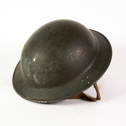 27 - WORLD WAR II TIN HELMET