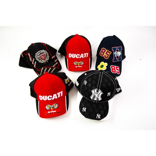 482 - CapsA diverse collection of nine high-quality caps, each representing a piece of motorsport and urba... 