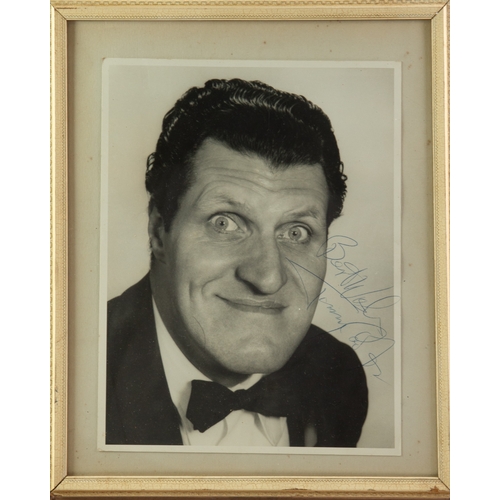 61 - CIRCA 1960's TOMMY COOPER SIGNED BLACK AND WHITE PHOTOGRAPH, bust image, in black bow tie, inscribed... 