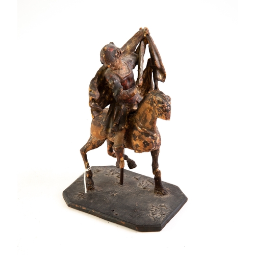 196 - 16TH CENTURY ITALIAN CARVED AND GILTWOOD EQUESTRIAN FIGURE OF ST MARTIN on oblong base, 9 1/2