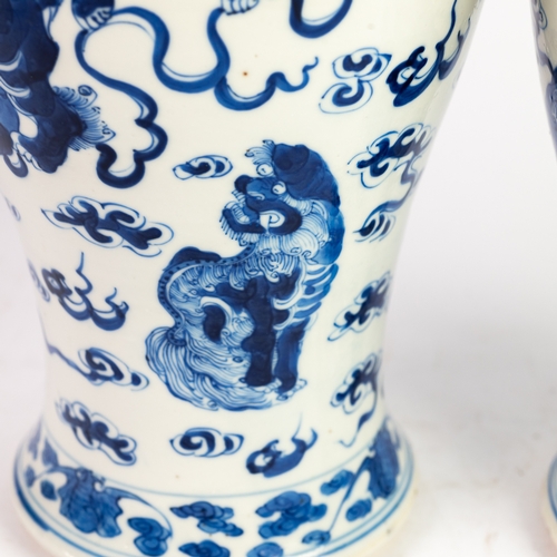 144 - PAIR OF CHINESE LATE QING DYNASTY PORCELAIN INVERTED BALUSTER-SHAPE COVERED VASES, well painted in u... 