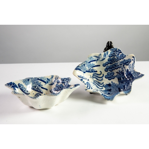 182 - PAIR OF NINETEENTH CENTURY BLUE AND WHITE POTTERY, LEAF SHAPED PICKLE DISHES, printed in the willow ... 