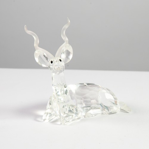 36 - FIVE BOXED SWAROVSKI GLASS MODELS OF ANIMALS, comprising: THREE FROM THE ‘INSPIRATION AFRICA’ SERIES... 