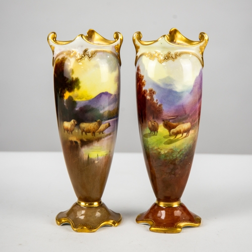 90 - ROYAL DOULTON VASES: A pair of rococo porcelain vases decorated with hand painted lakeland scenes wi... 