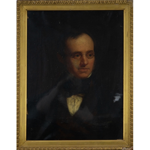 238 - UNATTRIBUTED (EARLY NINETEENTH CENTURY)OIL ON CANVAS Shoulder length portrait of a bespectacled gent... 