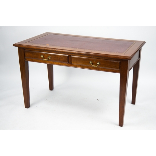 197 - EARLY TWENTIETH CENTURY MAHOGANY WRITING TABLE, the moulded oblong top with gilt tooled red leather ... 