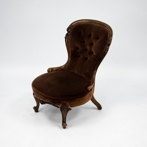 199 - LATE VICTORIAN CARVED WALNUT NURSING CHAIR, the moulded show wood frame with buttoned back and bow f... 