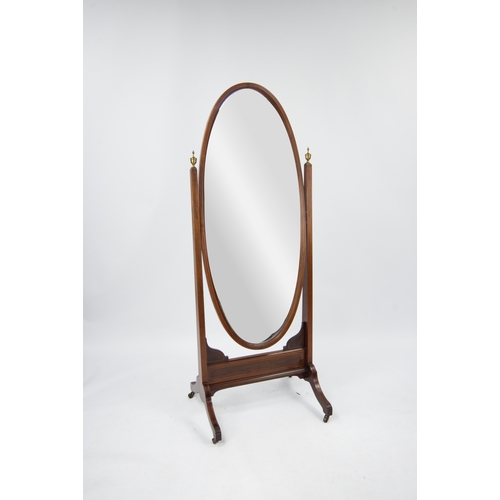 130 - EDWARDIAN LINE INLAID MAHOGANY CHEVAL DRESSING MIRROR, the bevelled, oval plate in a conforming fram... 