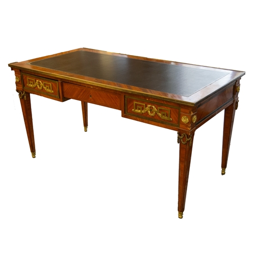 158 - MODERN EMPIRE STYLE FRENCH GILT METAL MOUNTED BUREAU PLAT, the crossbanded oblong top with faux blac... 